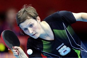 Viktoria Pavlovich of Belarus competes against Kristin Silbereisen of Germany during their women's table tennis match at the 2012 Summer Olympics, Sunday, July 29, 2012, in London. (AP Photo/Sergei Grits)